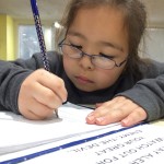 Working on homework and learning God's word is an important part of Mission Arlington's "after-school" programs.