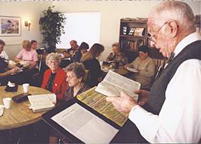 Jack Longgrear, teaching God's Word, in a central Arlington apartment community which he pastored for more than 2 decades. Imogene was the children's ministry leader.